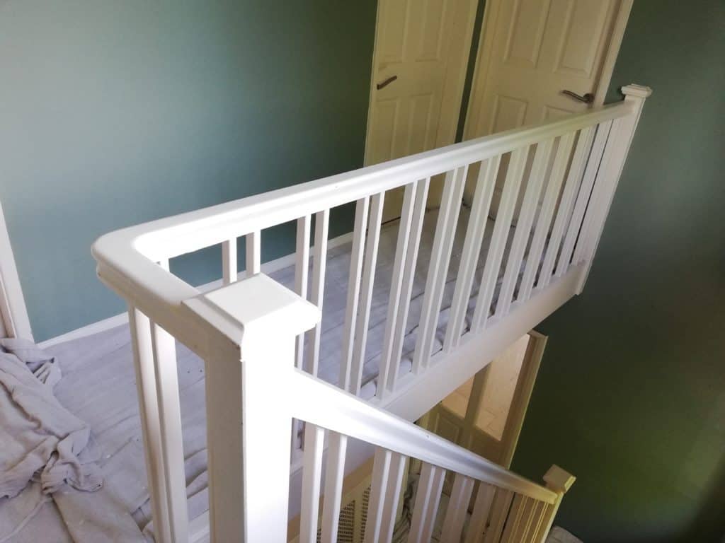 A painter decorating a hallway in chesterfield